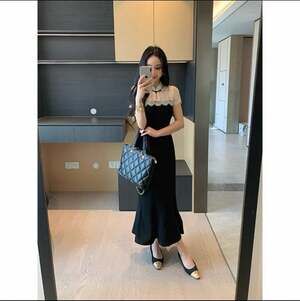 Sleeveless Black Dress With White Bow Detail on ,